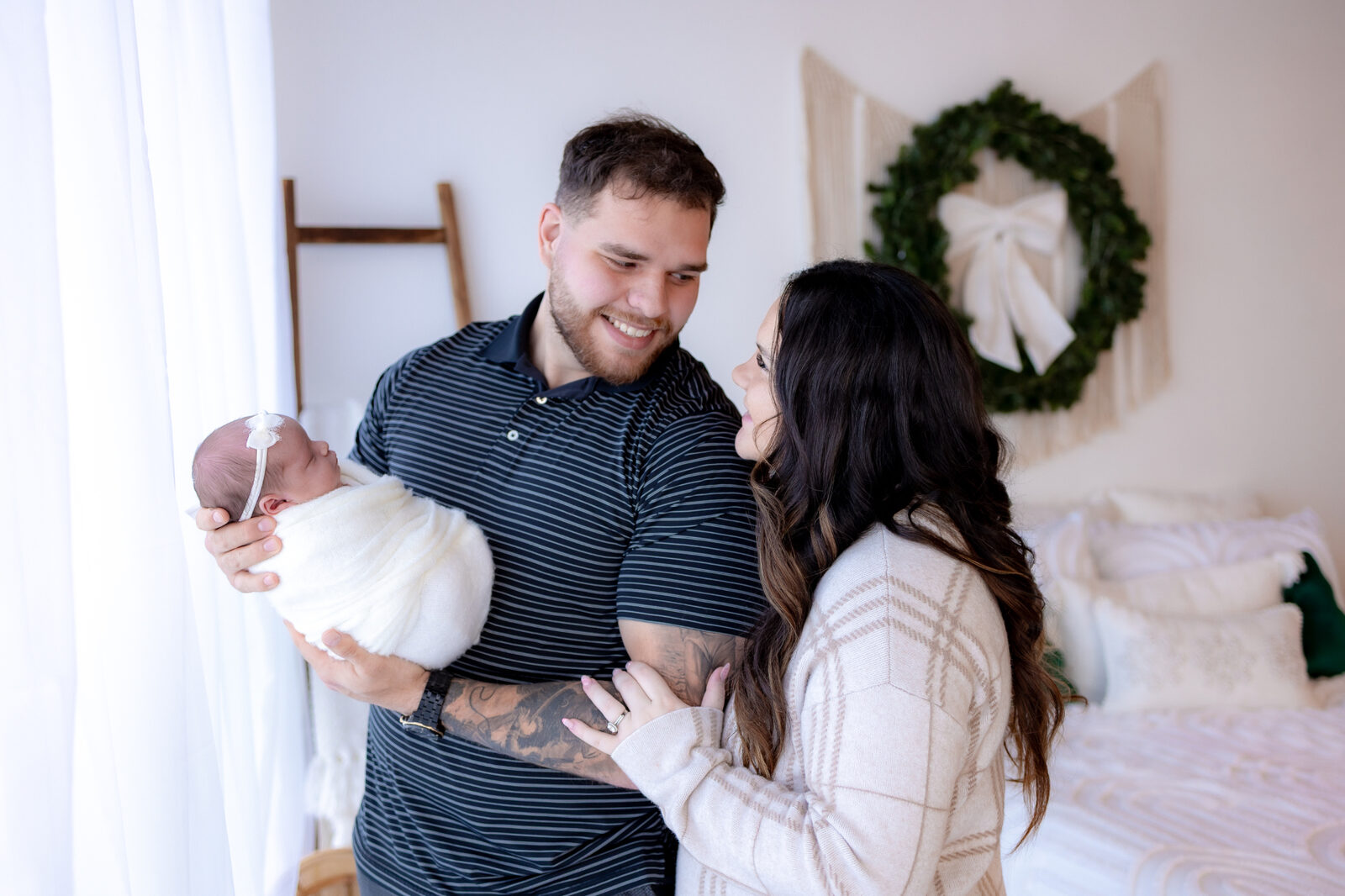 Cole and Laiken with their newborn daughter